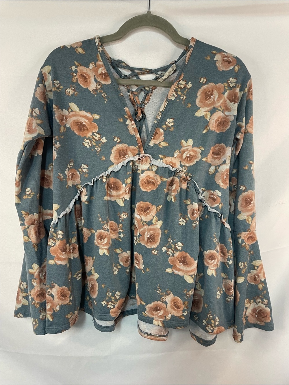 Altar’d State flora blouse, very fun bell sleeves and laces up back! No fab tag
